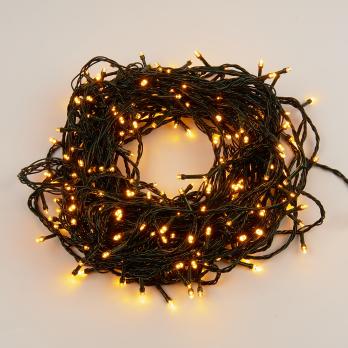 ULD-S10000-1000-DGA WARM WHITE IP20 Гирлянда светодиодная. 100м. 1000 светодиодов. Теплый белый свет. Провод зеленый. ТМ Uniel