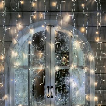 ULD-C3020-264-TTK WARM WHITE IP44 Занавес светодиодный с эффектом мерцания. 3х2м. 264 светодиода. Теплый белый свет. Провод прозрачный. TM Uniel